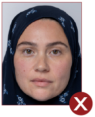 Image of unacceptable passport photo, patterned head covering
